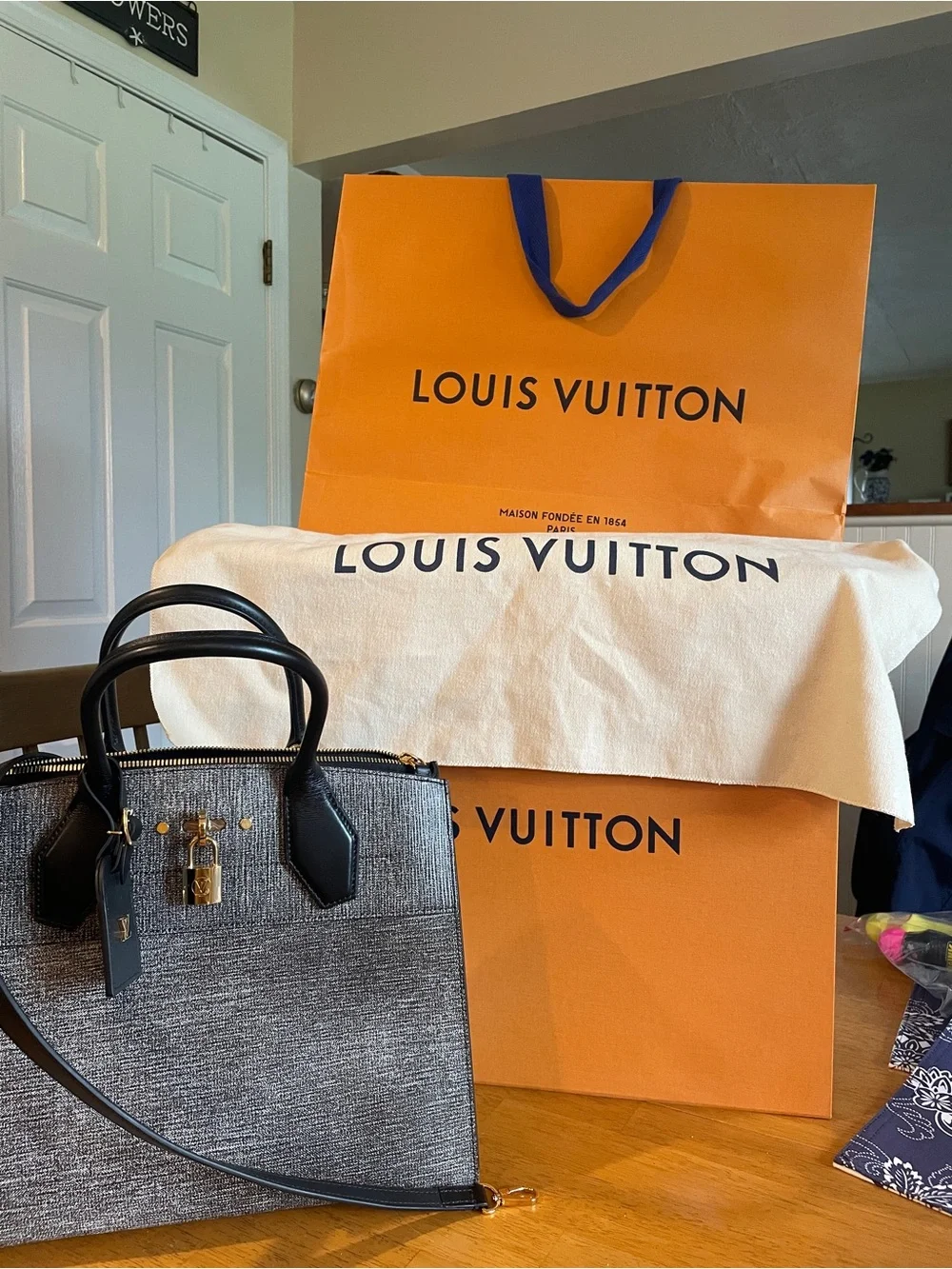 Louis Vuitton Gray and Black City Streamer bag with Gold Hardware.Used one time - Picture 1 of 2